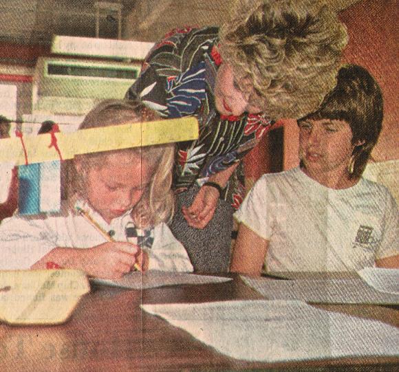 Dr. Paul Shoecraft explains MOVE IT Math to principal from Guadalajara.